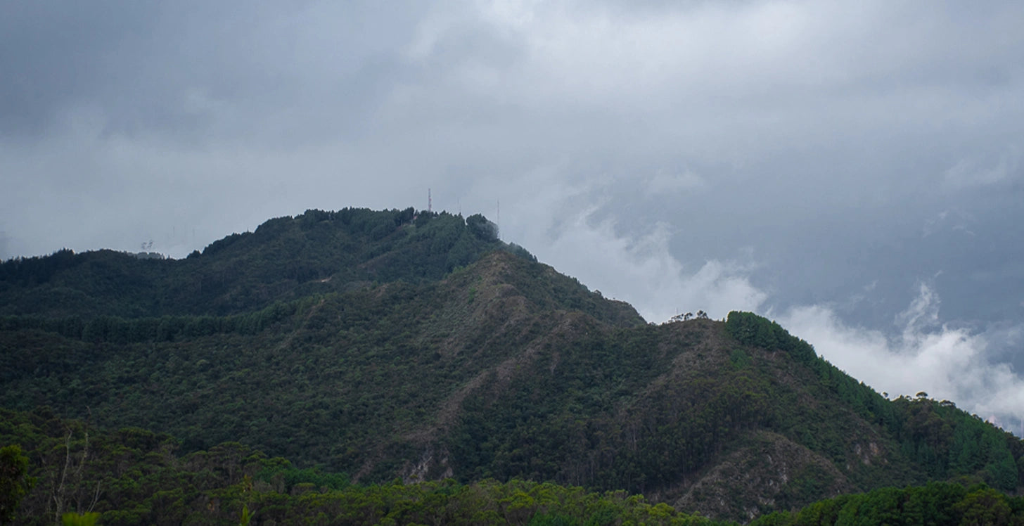 Mountainous landscape with a cloudy sky