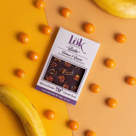 Chocolate bark packaging with bananas and physalis yellow and orange background