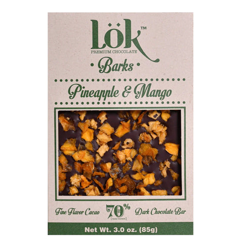 Lök Pineapple & Mango Barks packaging with chocolate pieces on a white background