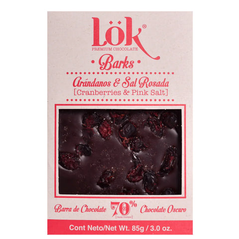 Lök Barks chocolate bar packaging with cranberries and pink salt on a white background